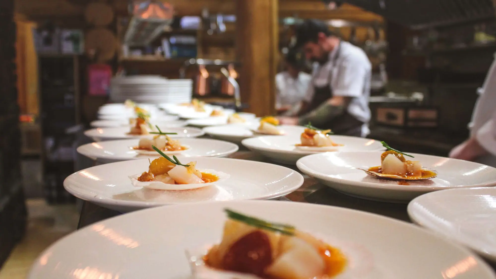 The Island Lake kitchen preparing plates for service