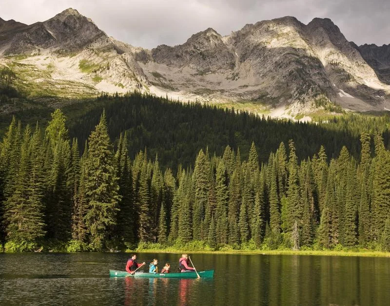Canoeing on Island Lake beneath the Lizard Range