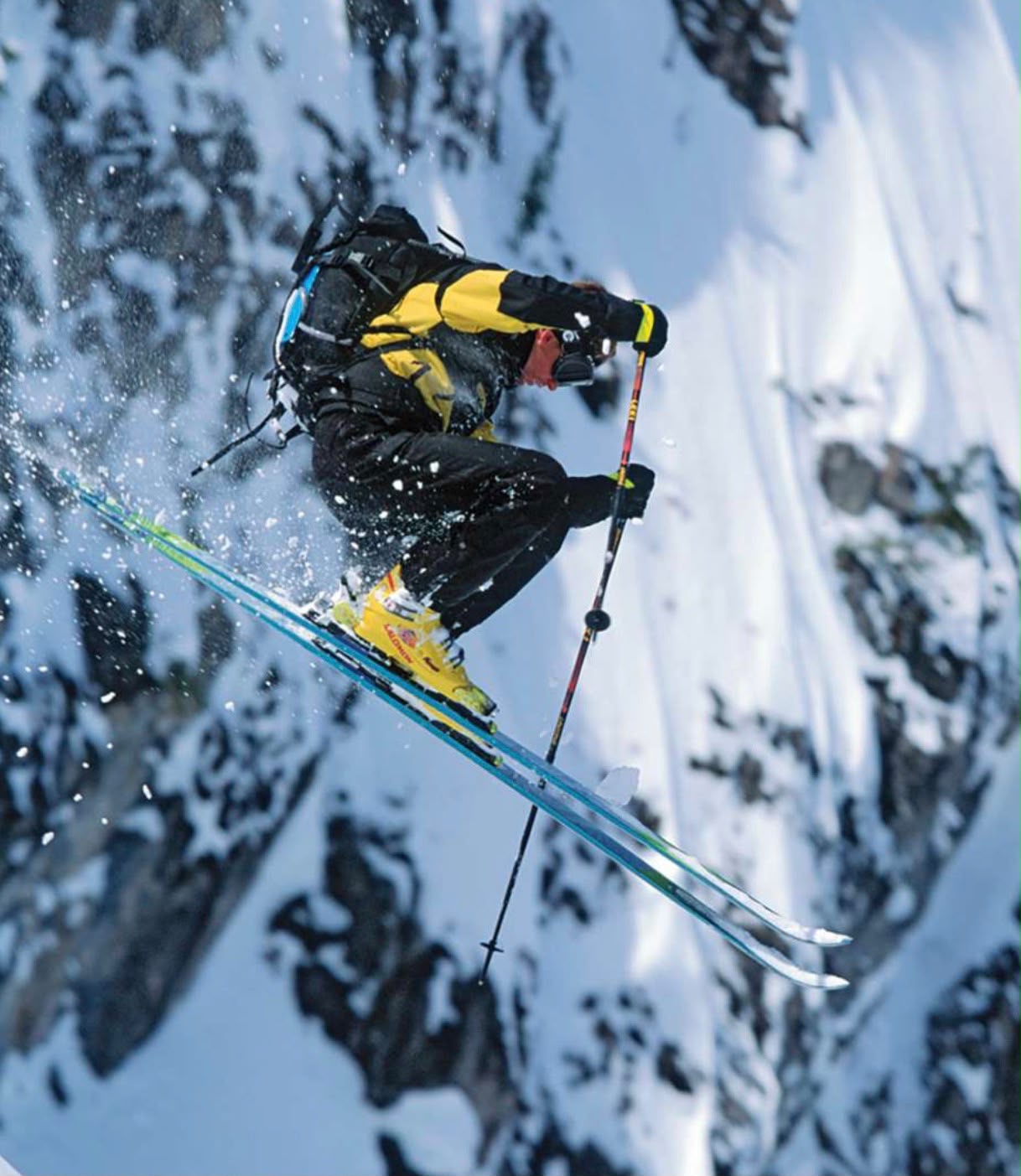Scot Schmidt airborne on skis at Island Lake.